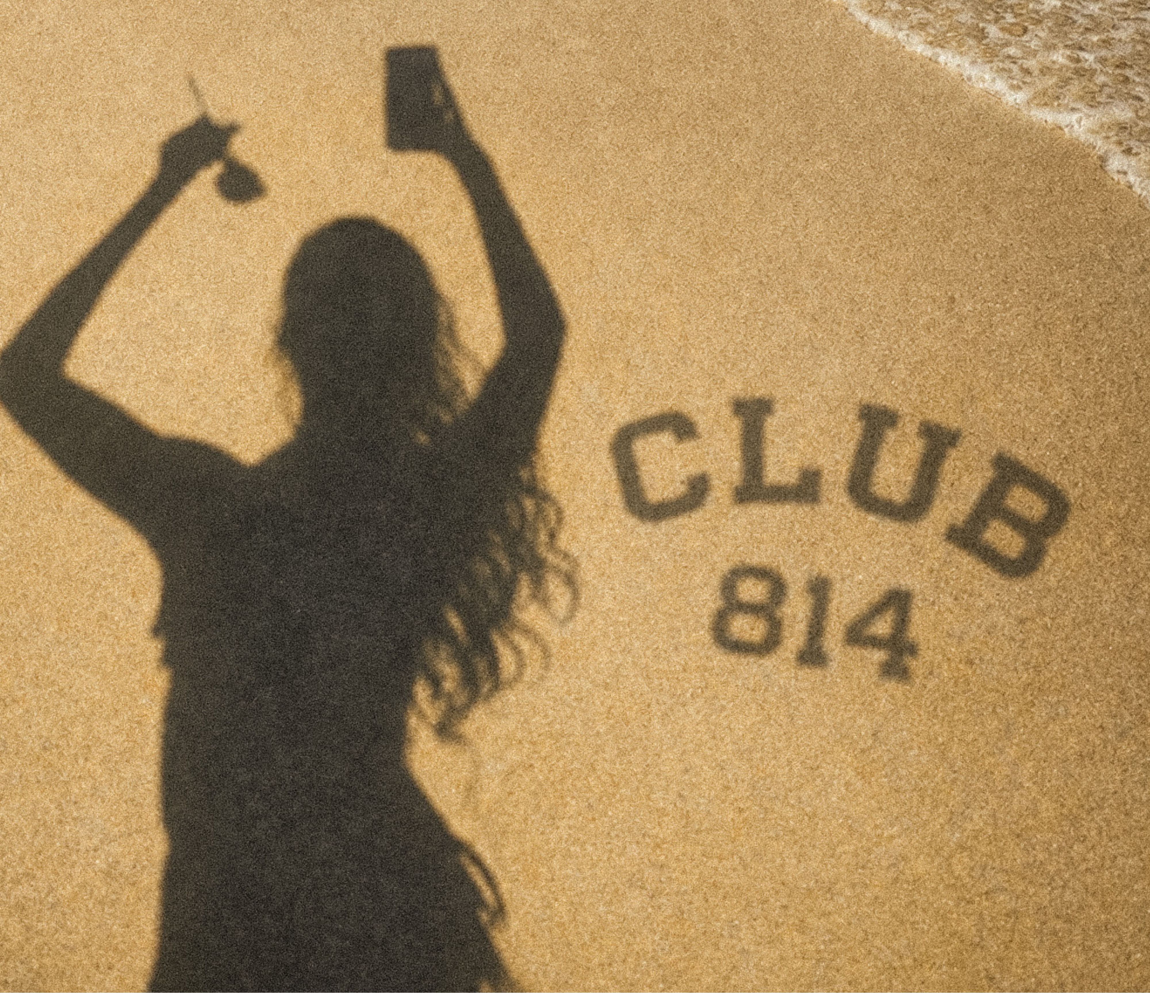 A beach scene with the silhouette of a person holding a drink and a phone, casting a shadow on the sand that reads 'CLUB 814'. Ocean waves are visible at the top right.