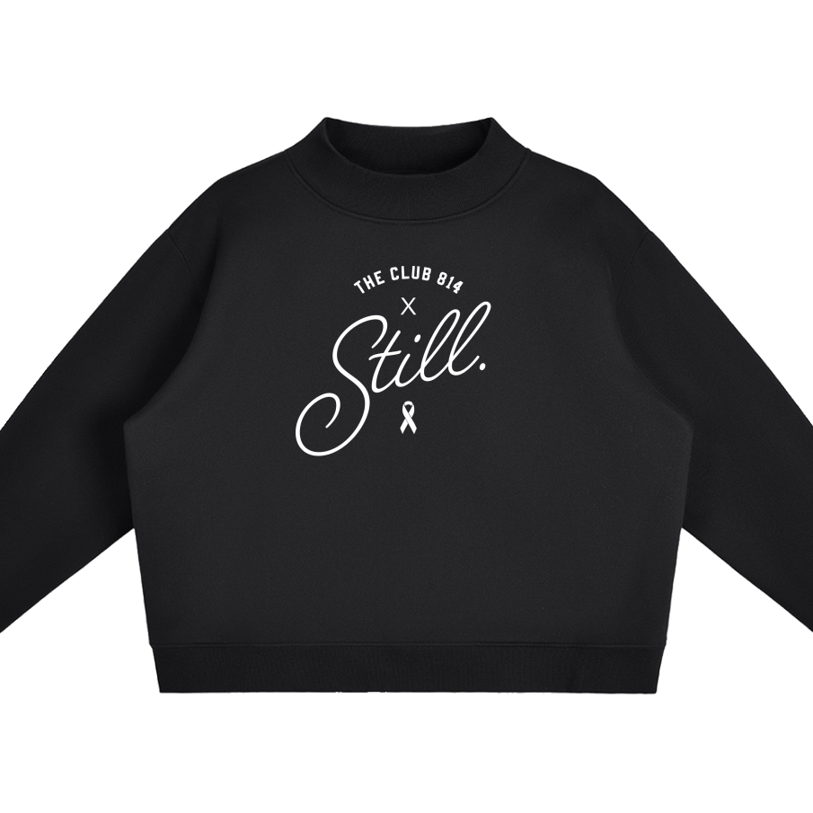 A black long-sleeve crewneck sweatshirt with a gray floral branch pattern printed on the front, displayed flat against a solid white background.
